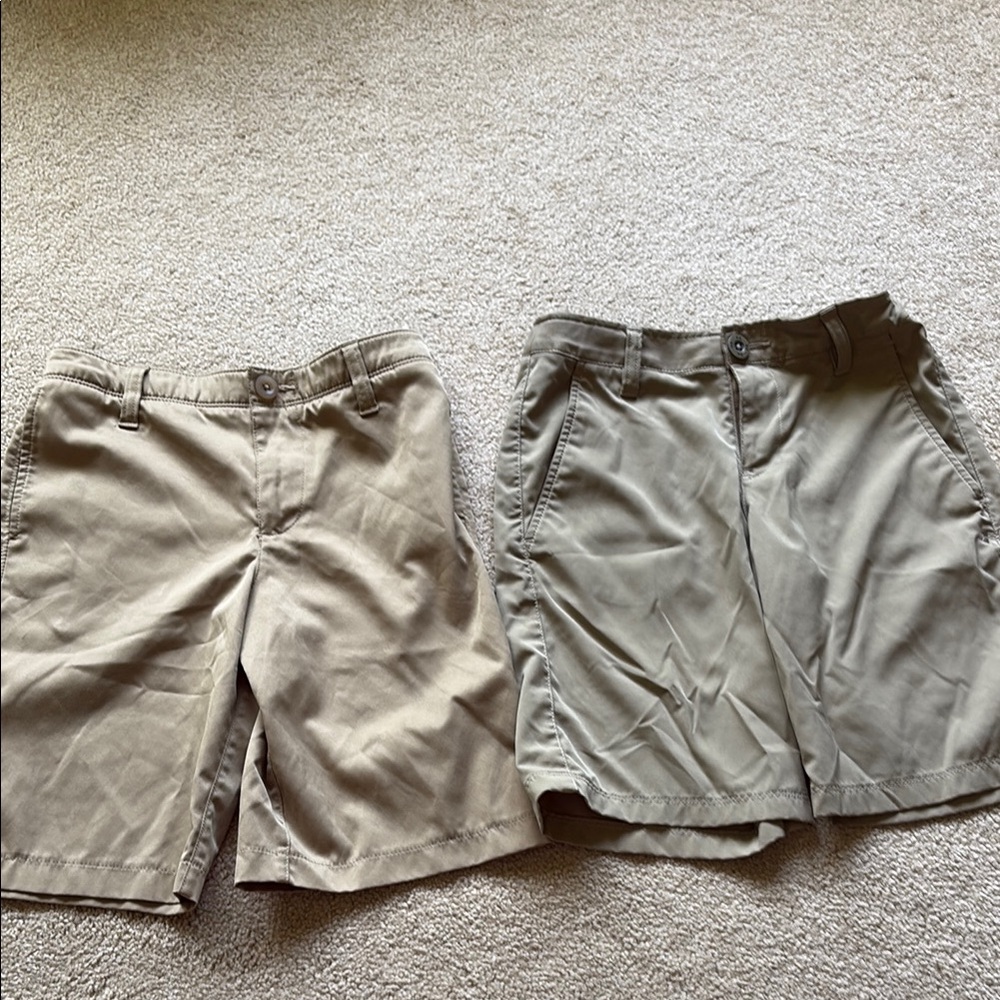 Two pairs of boys under armour khaki shorts in very good condition. Small & 10